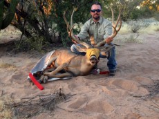 Donnie with mule deer buck